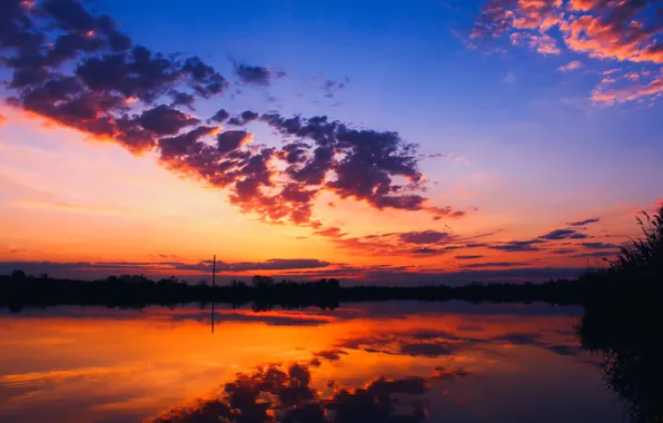 Picture clouds, sunset, river, contrast