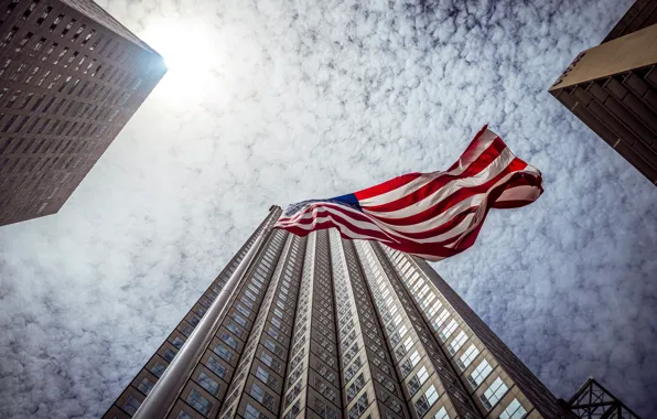 The sky, the city, flag