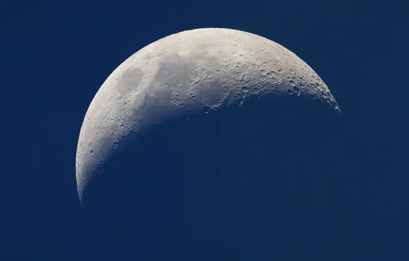 The moon, shadows, craters, sea