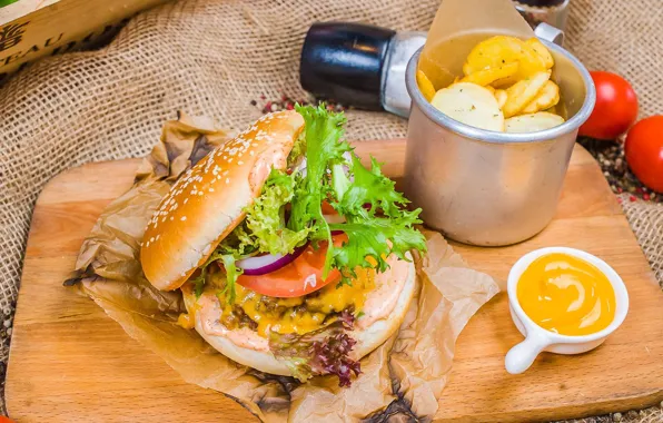 Burger, potatoes, mustard