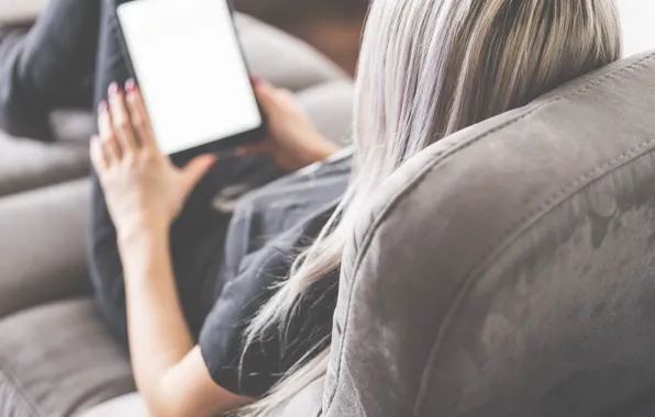 Girl, sofa, tablet, reads, her grey hair