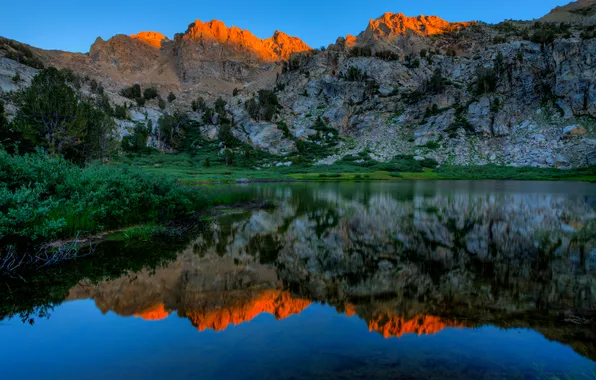 Water, trees, sunset, mountains, lake, reflection, stones, rocks