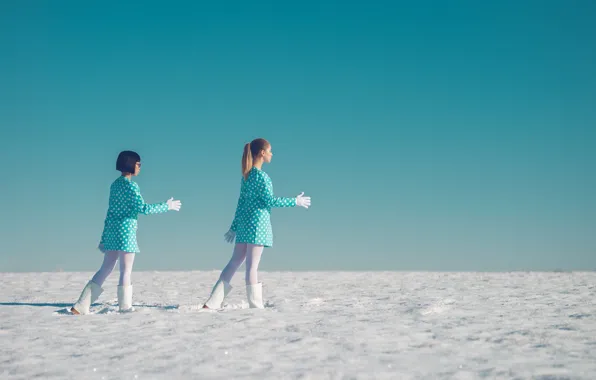 Snow, dance, two girls
