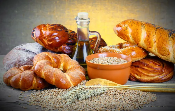 Picture grain, oil, plate, bread, roll, pretzel, bottle