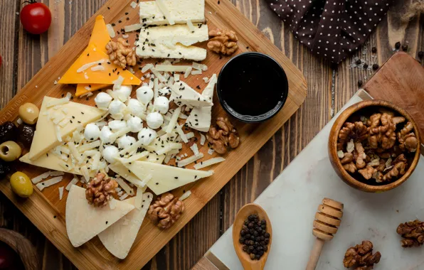 Cheese, plate, pepper, nuts, honey, olives, tomatoes, sesame