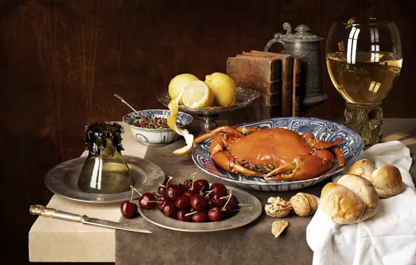 Wine, lemon, glass, books, crab, walnut, bread, knife