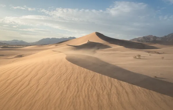 Sand, the sky, clouds, light, mountains, the dunes, people, hills