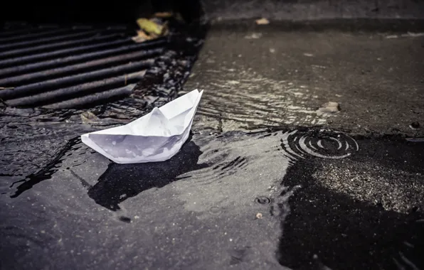 The city, street, puddle, boat