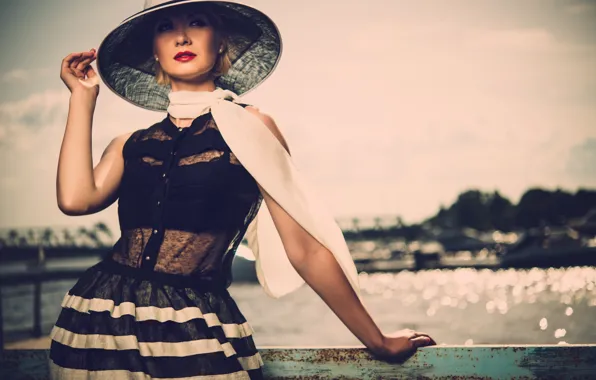 Girl, river, railings, hat, scarf