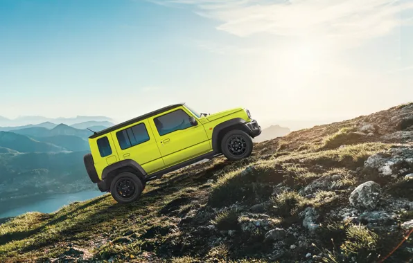 Picture the sky, landscape, mountains, tilt, jeep, Suzuki, side view, bokeh