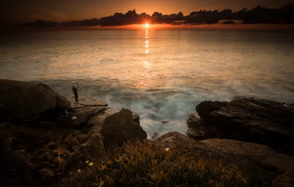 Sea, sunset, fisherman