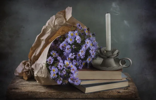 Books, candle, asters