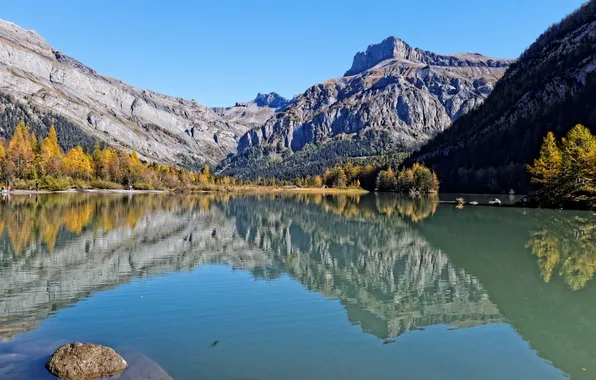 Picture autumn, the sky, trees, mountains, lake, stones