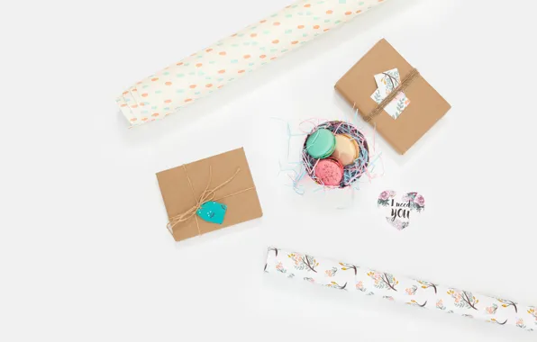 Picture the inscription, box, macaroon, wrapping paper
