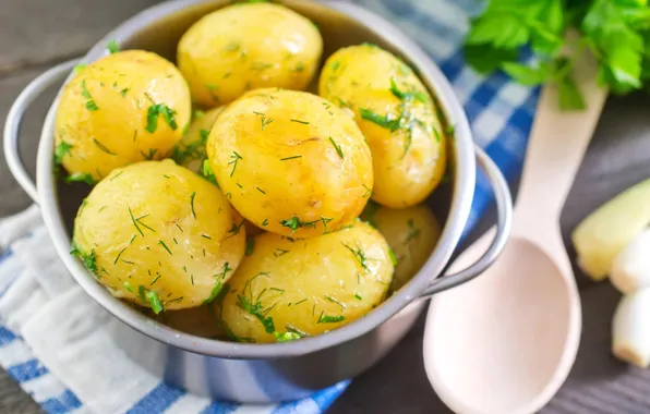 Greens, spoon, potatoes, boiled