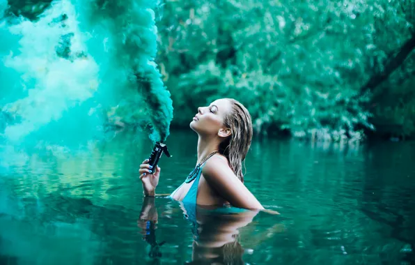 Picture girl, river, smoke, in the water