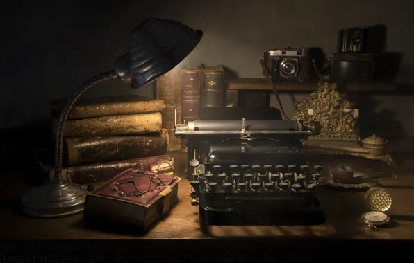 Picture glasses, book, typewriter
