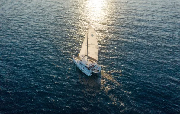 The way, movement, the ocean, sails, walk, catamaran, the sun's reflection in the water, the