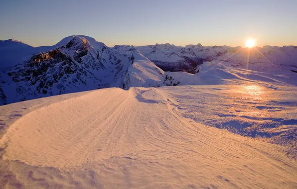 The sun, snow, mountains, tops