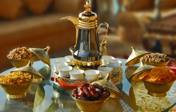 Picture table, kettle, Cup, plates, fruit, nuts, serving, dates