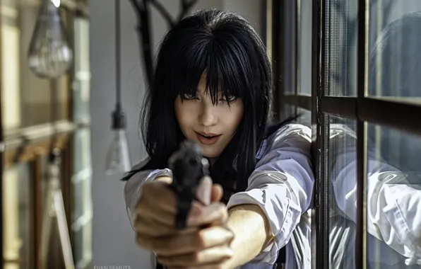 Picture black hair, mercenary, hell of a grin, Tanja, the barrel of a gun, Evan Semura