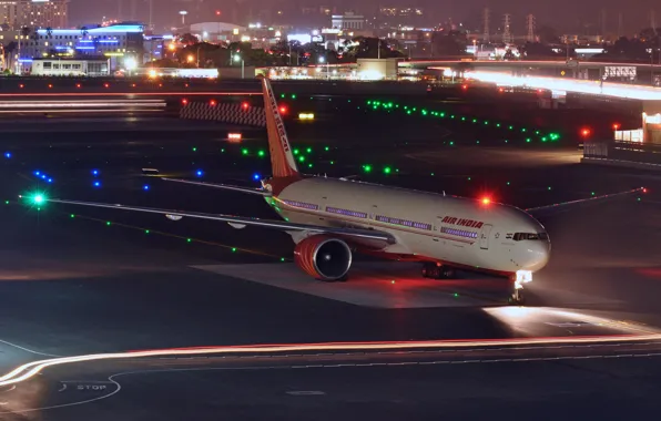 Lights, the evening, the airfield, a passenger plane