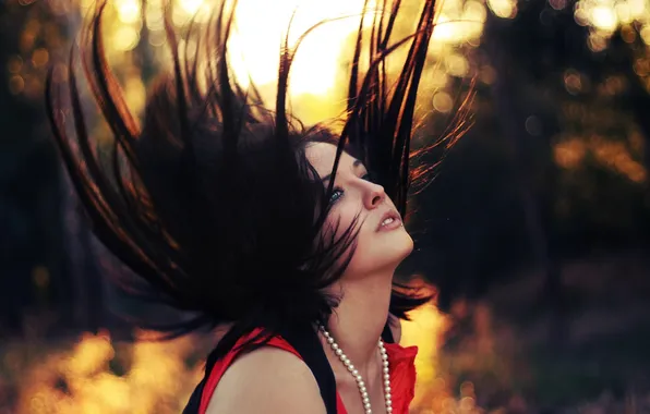 Sunset, movement, hair, beads