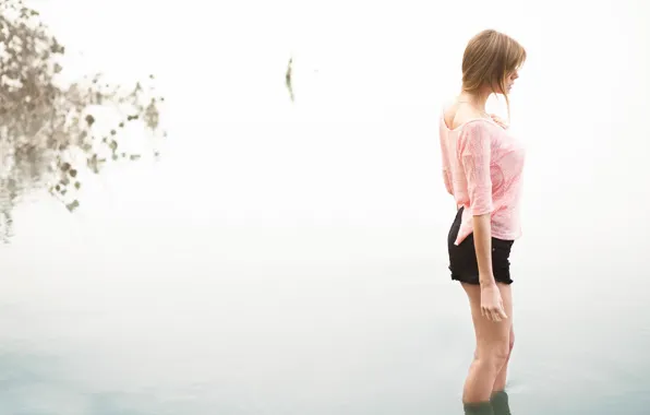 Girl, shorts, in the water, reflections