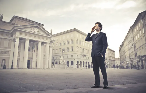 The city, people, street, glasses, costume, phone, male, jacket