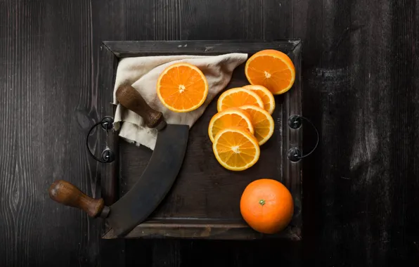 The dark background, Board, oranges, knife, fabric, slices, tray, cutting