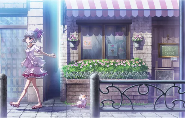 The girl walking down the street, and sitting cat, past the shops