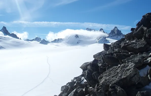 The sky, snow, mountains