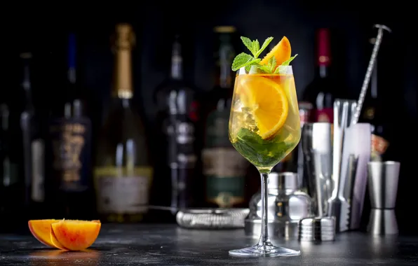 The dark background, table, wine, glass, oranges, alcohol, cocktail, dishes