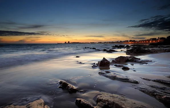 Picture sea, beach, the sky, sunset, the city, lights, stones, the evening