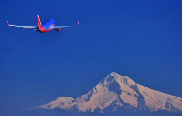 Picture the sky, mountain, the plane