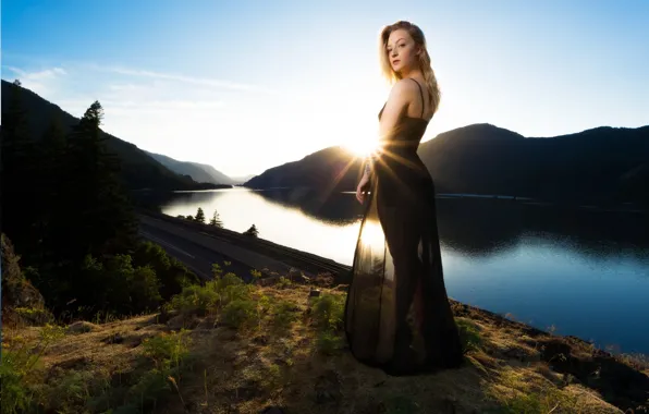 Girl, is, in the background, in a black dress, mountains