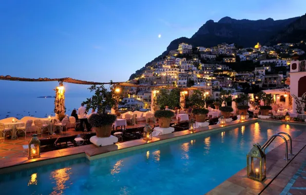 Picture sea, the city, the evening, pool, restaurant, the hotel, fantastic evening on a greek isle …