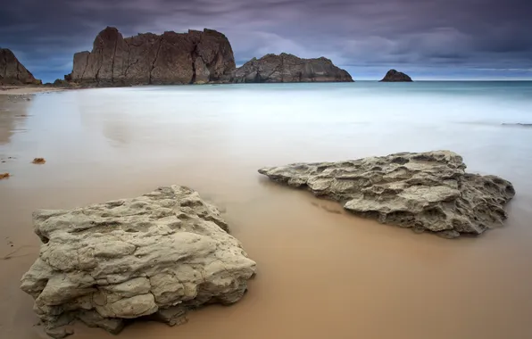 Sea, clouds, stones, rocks, shore, the evening