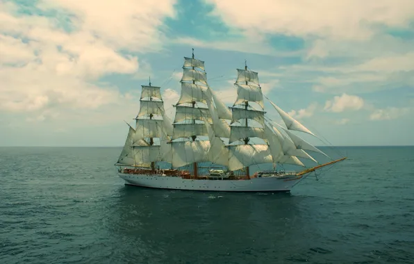 Picture the ocean, the sky, sailboat