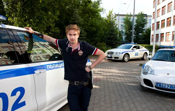 Machine, pose, police, the series, Alexander Petrov, Grigory Izmailov, police captain, A police officer with …