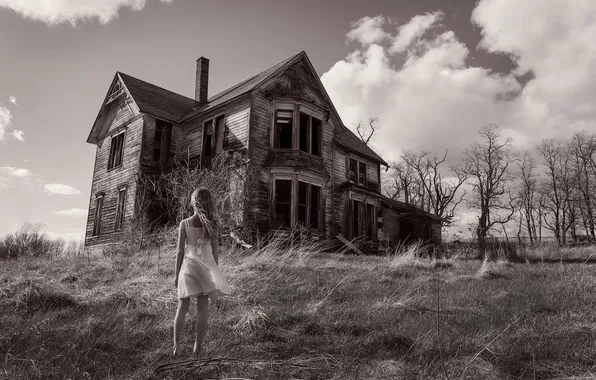 Girl, abandoned house, monochrome photo