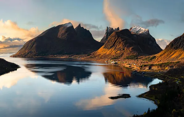 The sky, clouds, light, mountains, lake, reflection, rocks, shore