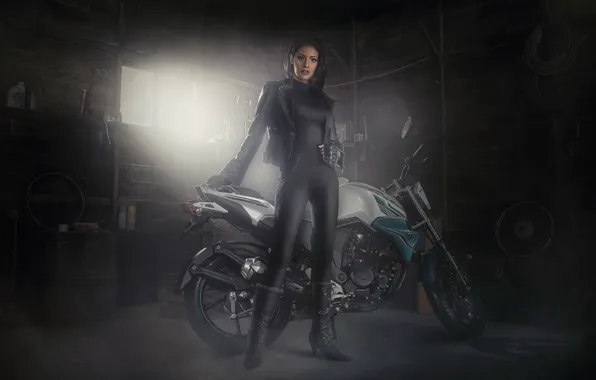 Girl, garage, motorcycle
