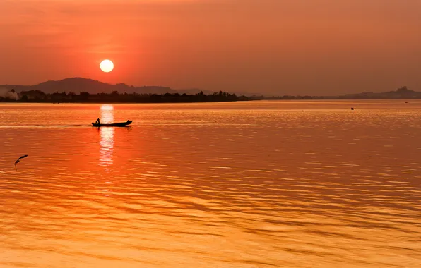 The sun, river, dawn, boat