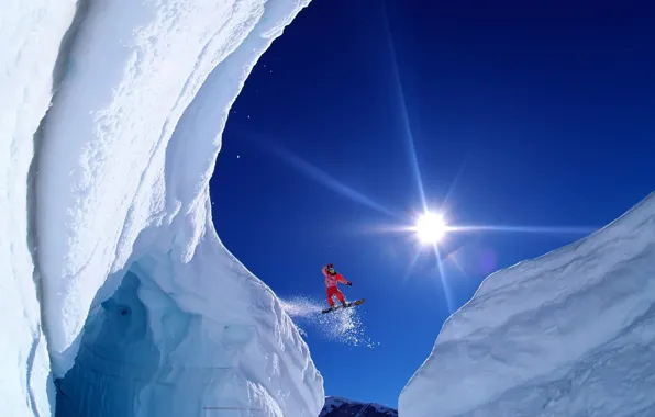 Picture the sun, snow, flight, mountains, extreme, snowboarder