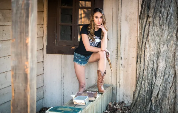 Picture girl, home, book, revolver