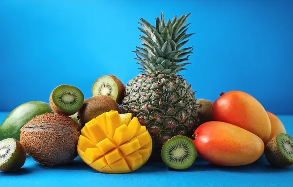 Kiwi, fruit, mango, pineapple, blue background, cuts, coconuts, tropical