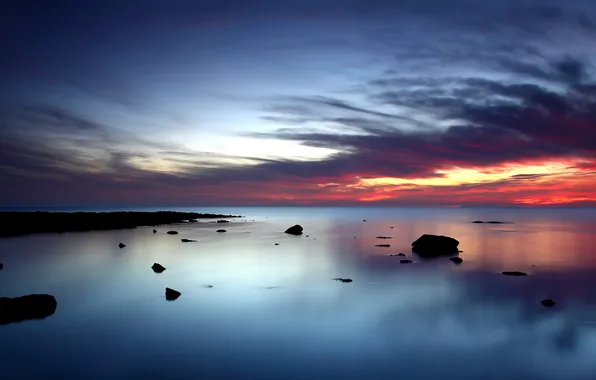 Sea, the sky, stones, Sunset