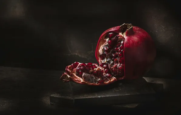 The dark background, table, fruit, still life, bars, garnet, composition, pomegranate grains