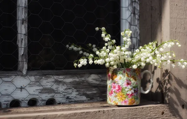 Window, mug, lilies of the valley